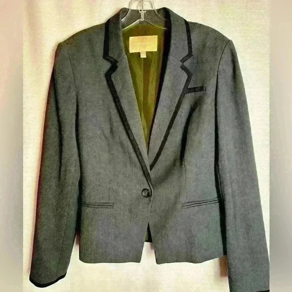 Banana Republic women’s jacket, size 6. Navy/dusty blue in color, w black stripe